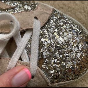 Silver glitter golden goose.  Blush suede trim
